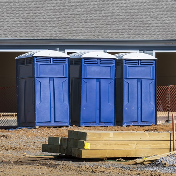 what is the cost difference between standard and deluxe portable toilet rentals in Parchman